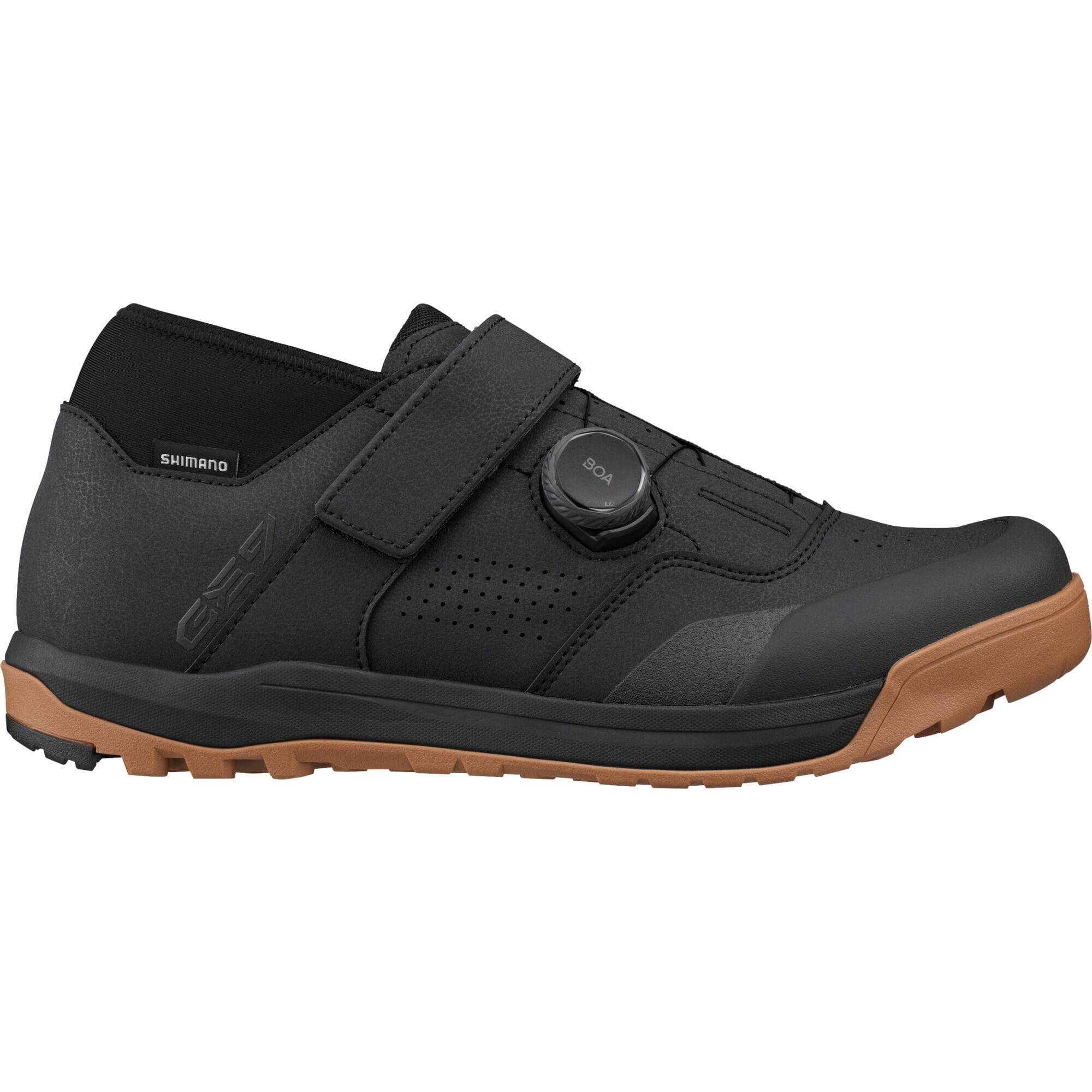 Shimano GE9 mountain bike shoes with BOA Fit System and SPD cleats, black athletic footwear for cycling.