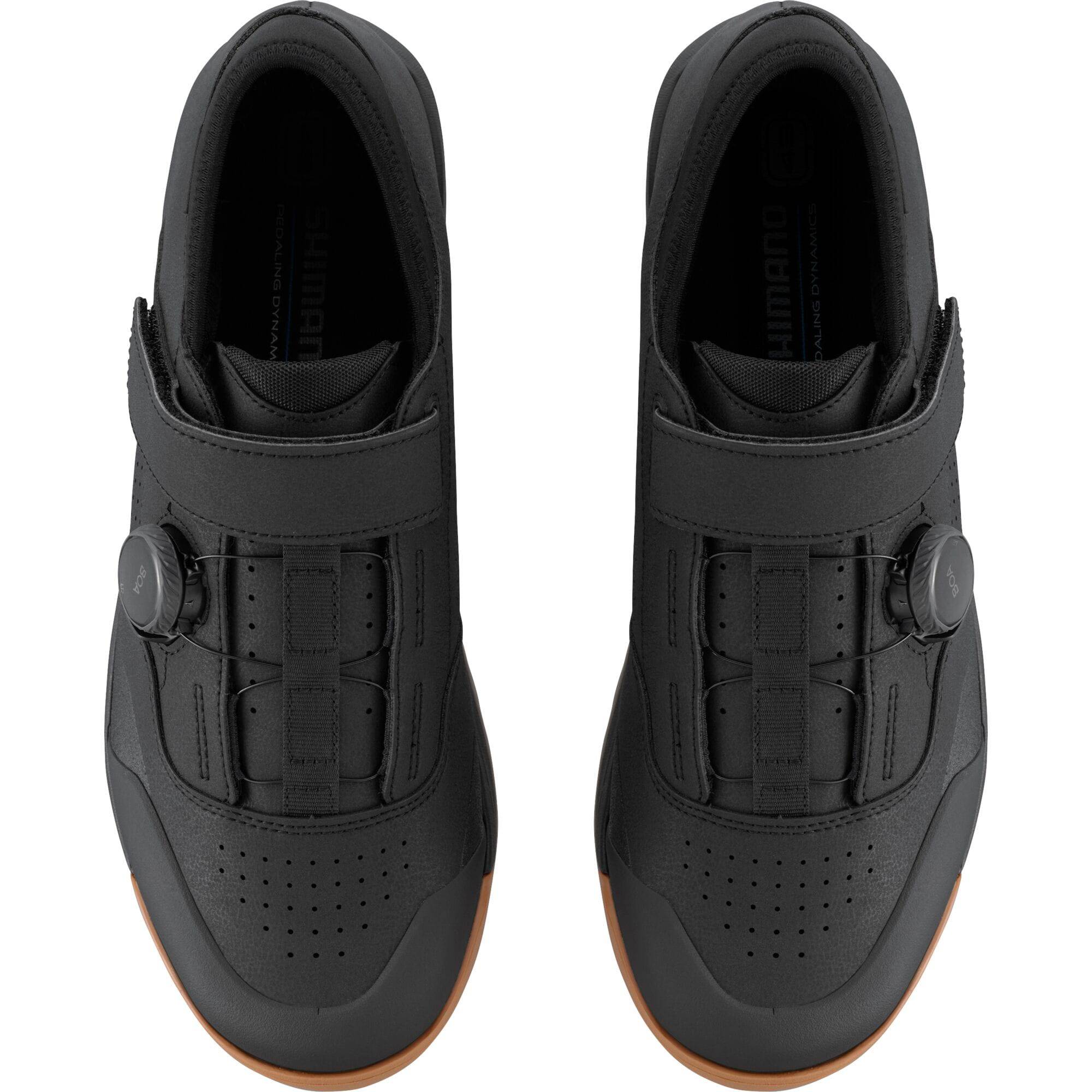 Shimano GE9 mountain bike shoes with BOA Fit System and SPD cleats, black and gray athletic cycling footwear.