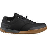 Shimano GF4W women's gravel and flat-pedal cycling shoes with ULTREAD® grip, shown in black with textured sole and secure straps.