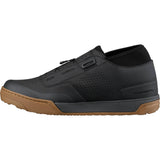 Shimano GF8 gravel riding shoes with BOA Fit System and SPD compatibility, showing the black and gray shoes with secure lacing