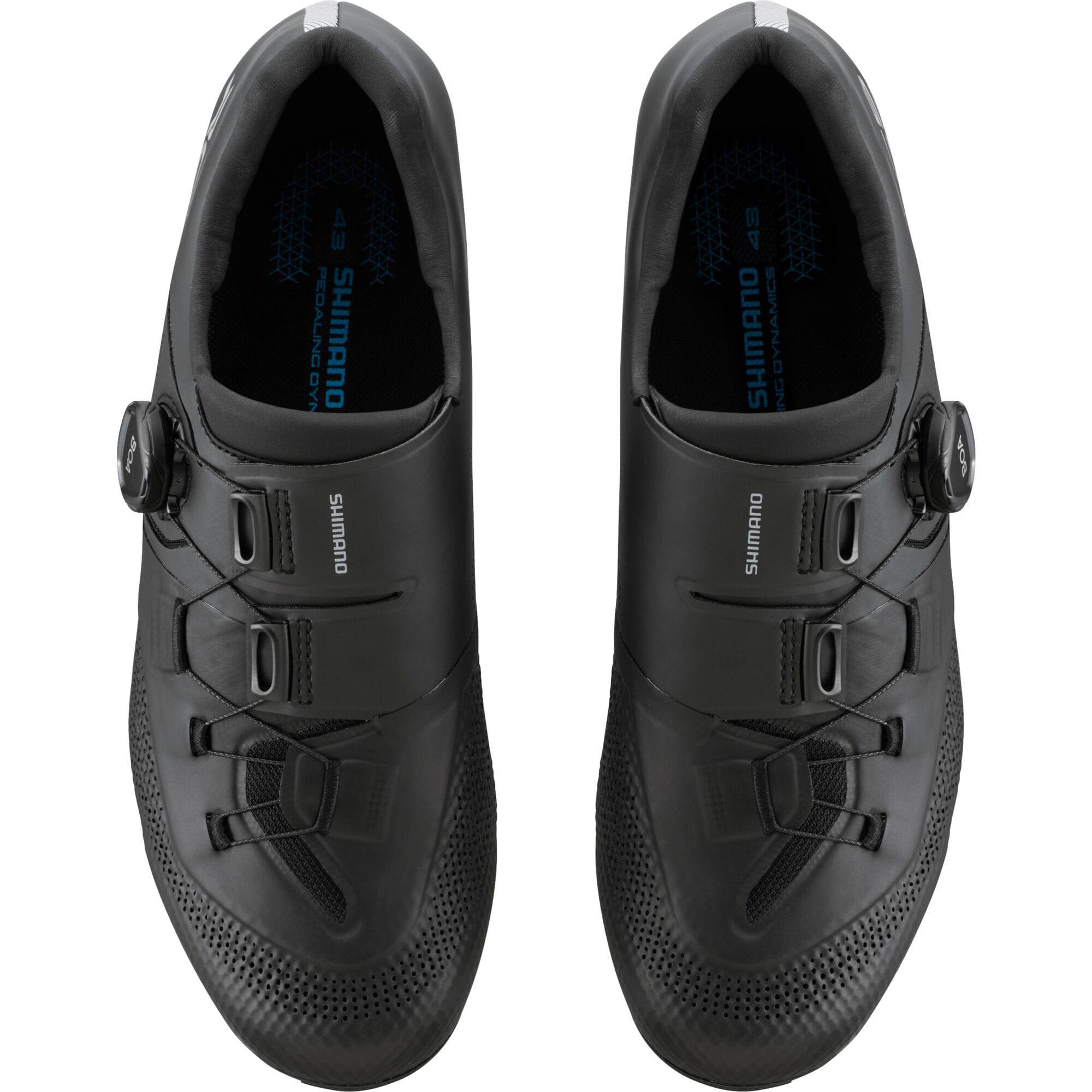 Shimano RC5 Road Cycling Shoes with BOA Fit System and carbon midsole, shown in a sleek black design.