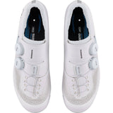 Shimano RC7W women's road cycling shoes with BOA fit system and carbon midsole, shown from the side with adjustable straps.