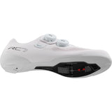 Shimano RC7W women's road cycling shoes with BOA fit system and carbon midsole, shown from the sole view.