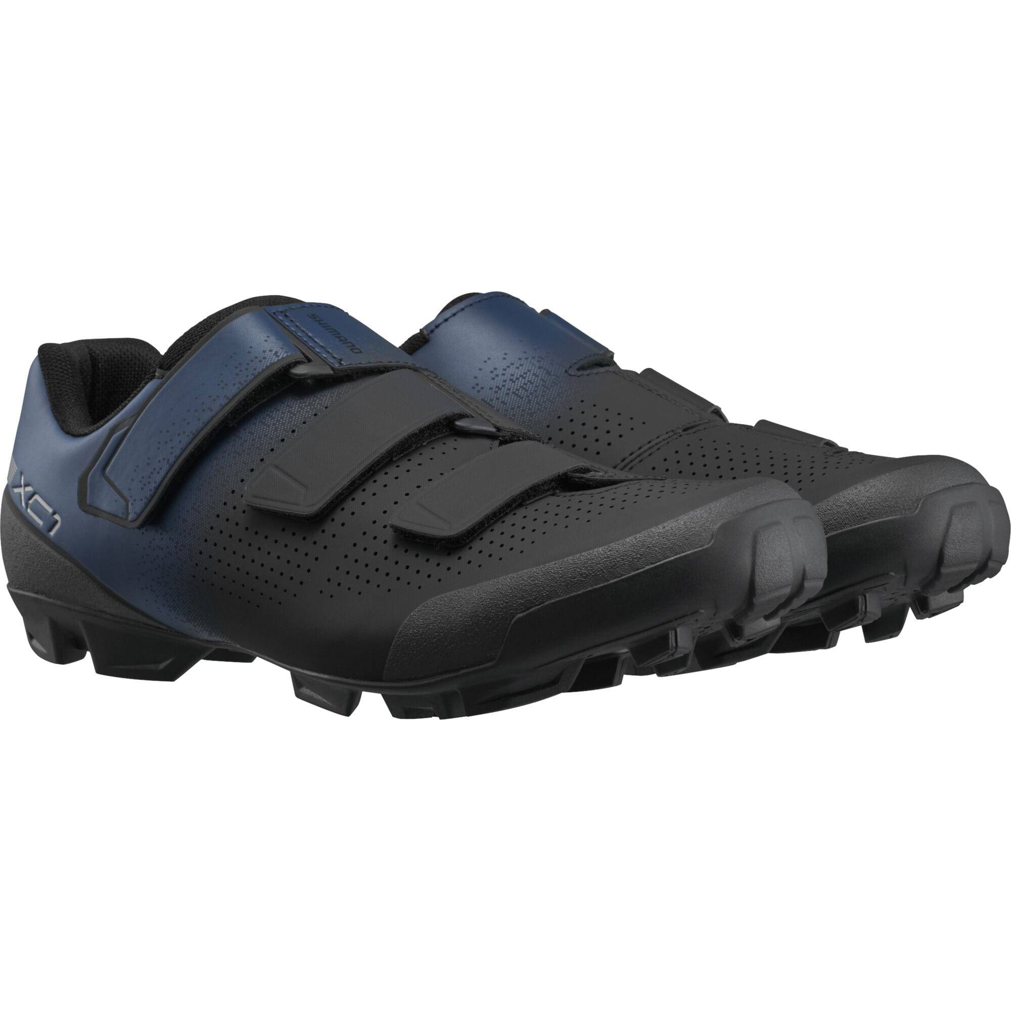Shimano XC1W women's mountain bike shoes with SPD compatibility and hook-and-loop straps, shown in black with synthetic upper.