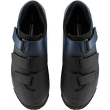 Shimano XC1W women's mountain bike shoes with SPD compatibility and hook-and-loop straps, shown in black and white design.