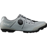 Shimano XC3 mountain bike shoes with BOA Fit System and SPD compatibility, shown from the front with black and gray design.