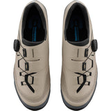 Shimano XC5 mountain bike shoes with BOA fit system and carbon fiber midsole, black and gray, shown from side angle.