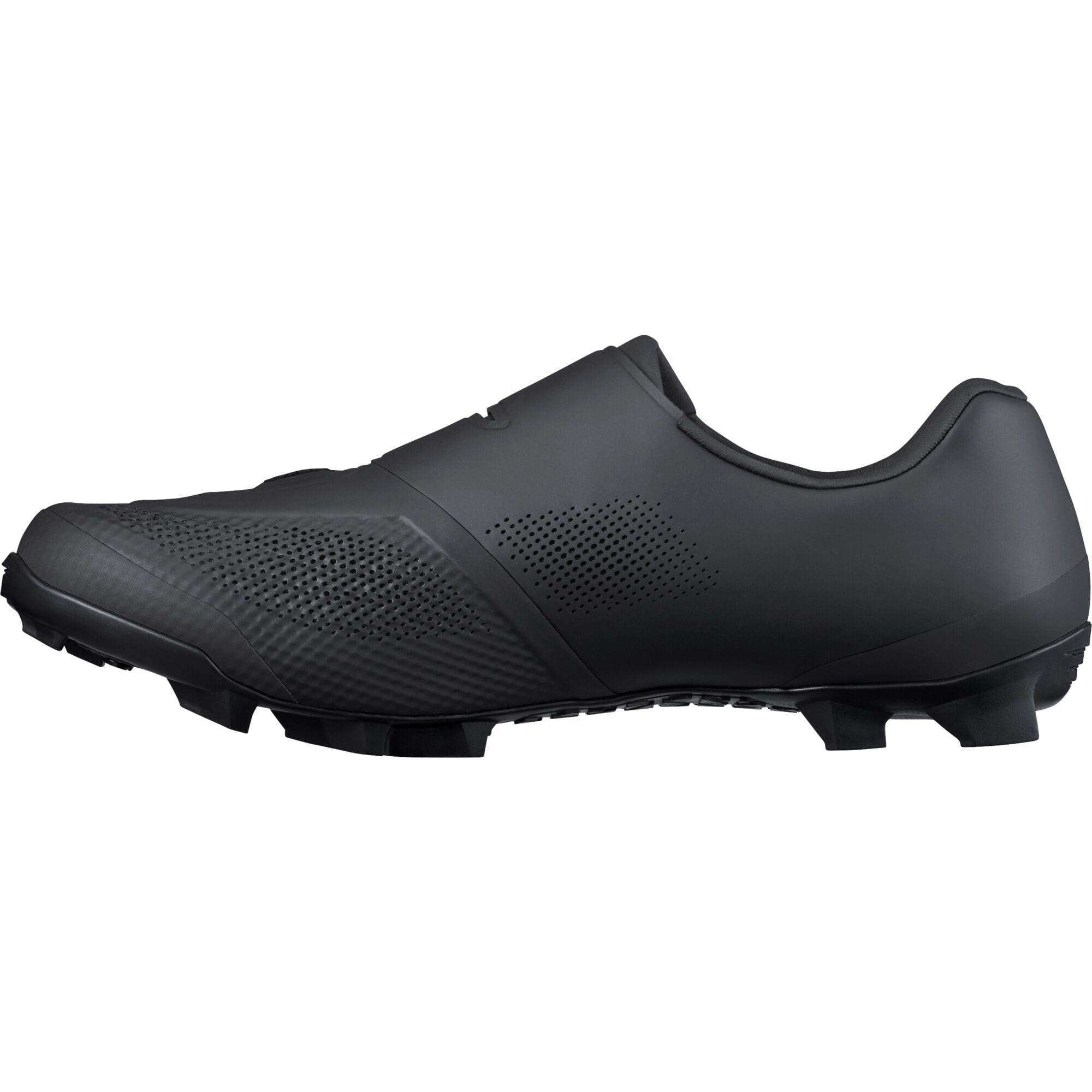 Shimano XC5 mountain bike shoes with BOA fit system and carbon fiber midsole, displaying black and white design on the bike shoe