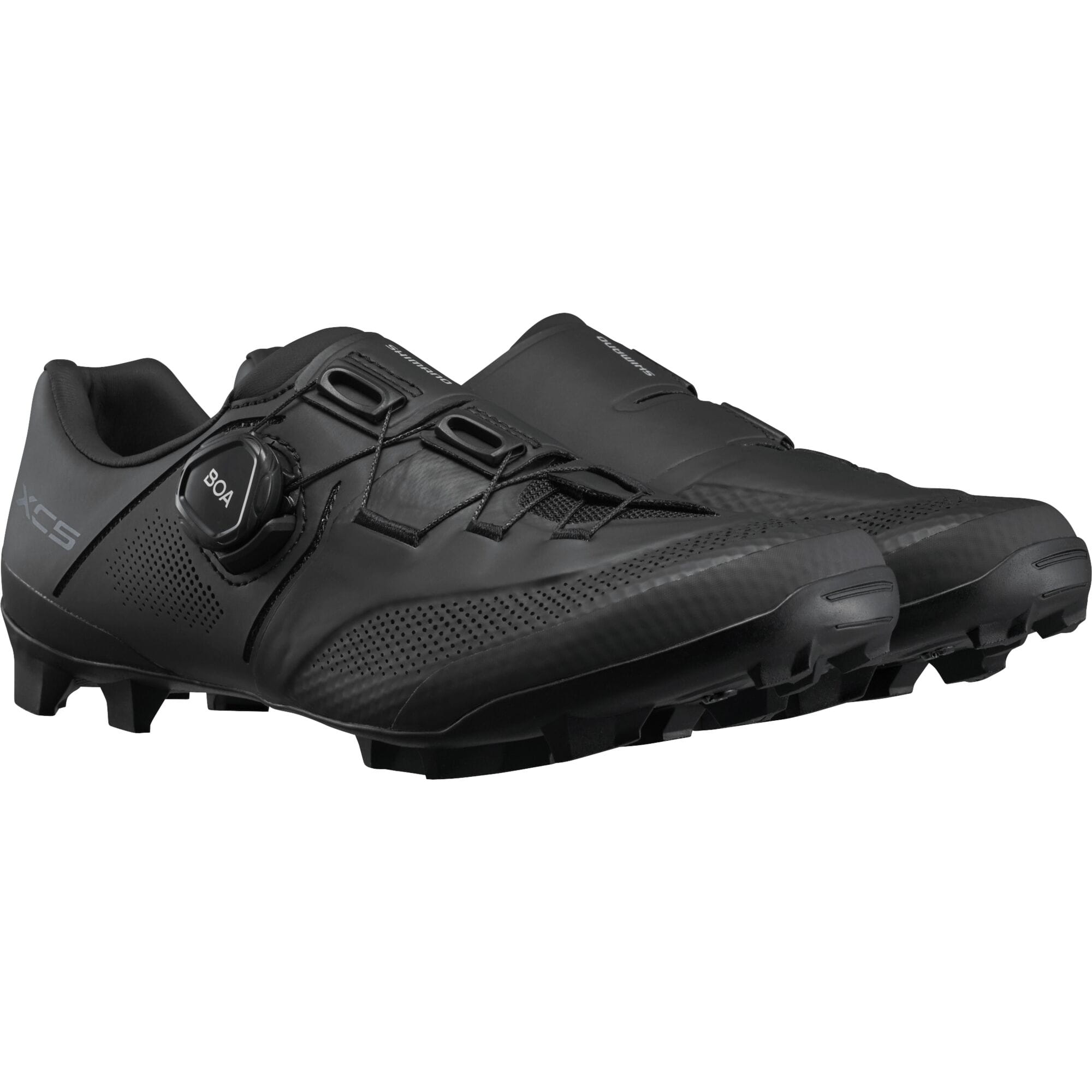 Shimano XC5W women's MTB cycling shoes with BOA Fit System, designed for off-road mountain biking, shown in a stylish black and white design.