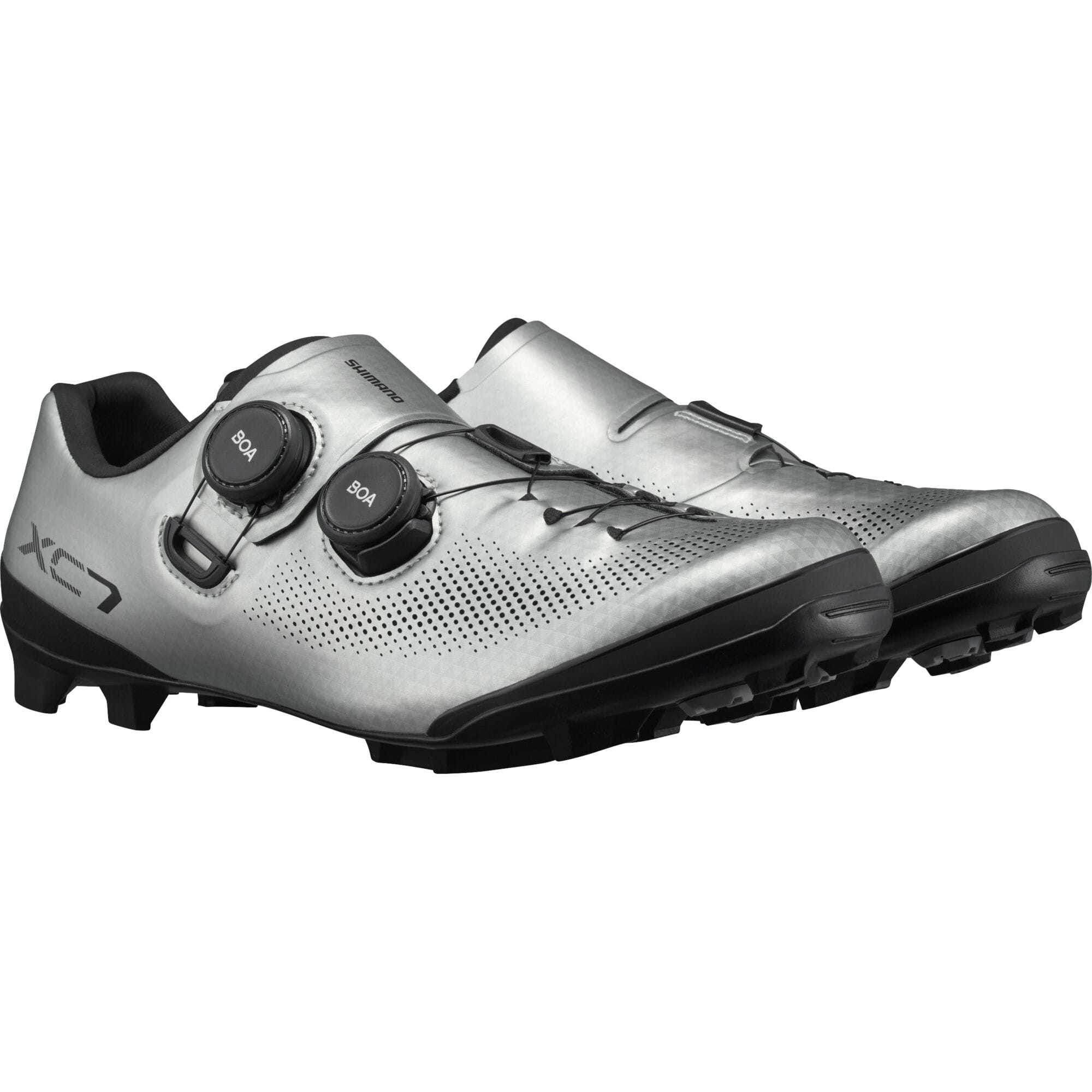 Shimano XC7 mountain bike shoes with BOA Fit System and SPD compatibility, shown in a close-up of the black and blue footwear.