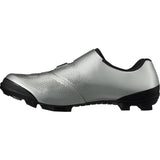 Shimano XC7 mountain bike shoes with BOA fit system and SPD compatibility, shown in black with rugged design and fastening system.