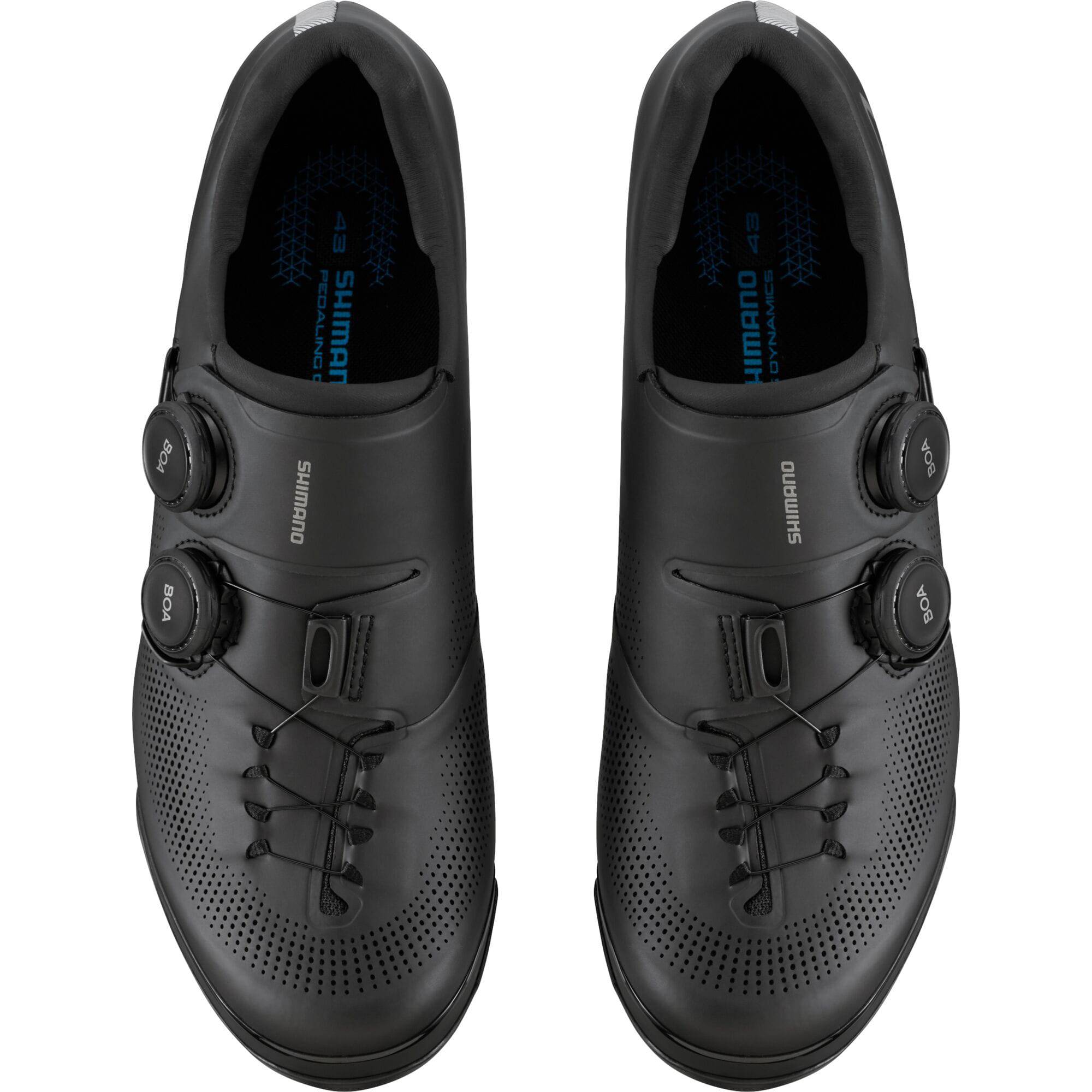 Shimano XC7 mountain bike shoes with BOA Fit System and SPD compatibility, shown in black with textured upper and secure lacing.