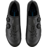 Shimano XC7 mountain bike shoes with BOA Fit System and SPD compatibility, shown in black with textured upper and secure lacing.