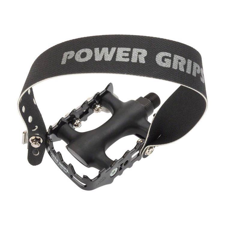 Powergrips XL spares and accessories for cage-type MTB pedals, including winter cycling straps, in a close-up image.