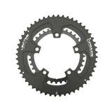 Praxis Works CR-110 BCD Buzz Rings compact chainrings for 10/11/12-speed road bikes, showing a close-up of the black chainring with teeth.