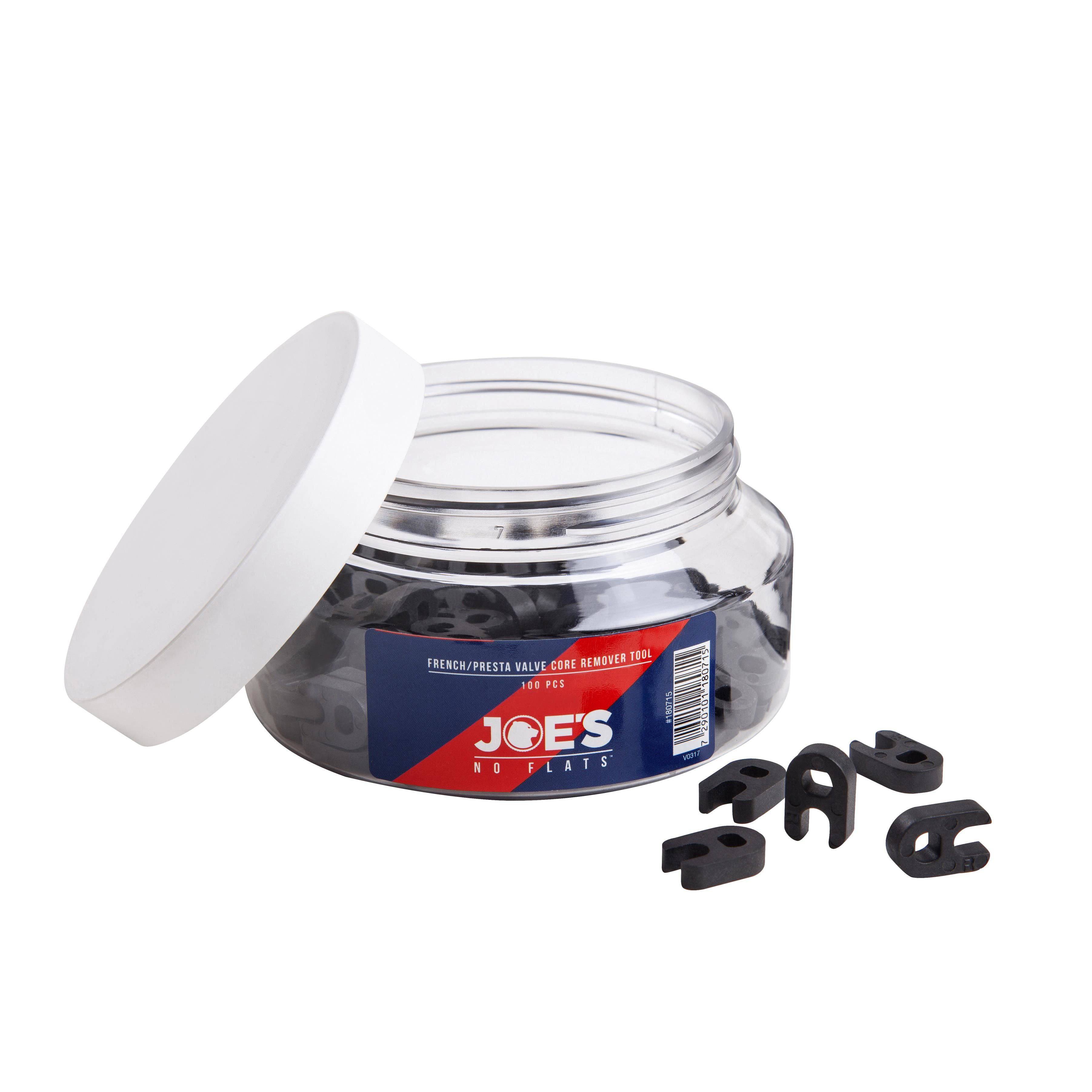 Joe's No Flats Presta valve key tool for tubeless tire maintenance, shown with multiple components in a box.