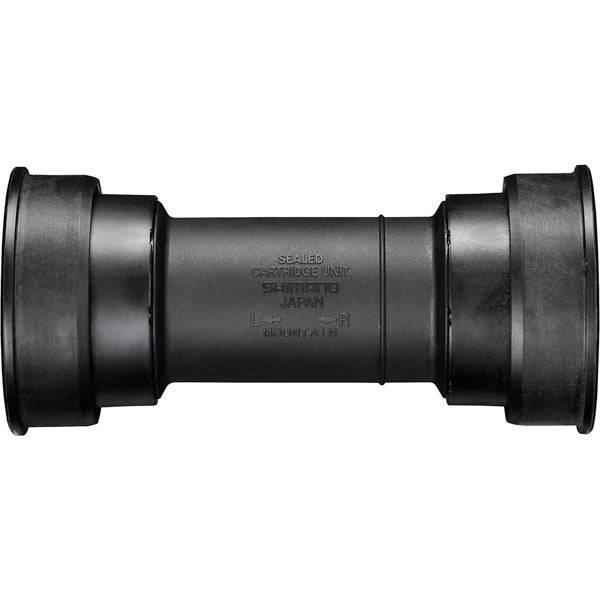 Shimano BB-MT800 MTB press fit bottom bracket with inner cover for 89.5 and 92mm shells, showing the component and cover in detail.