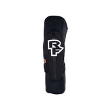 Race Face Indy Knee Guard 2022 with removable D3O foam protection, shown in black with adjustable straps for cycling or skateboarding.