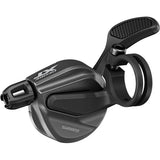 Shimano Deore XT SL-M8100 12-speed MTB shift lever band-on shifter, black, with ergonomic grip and gear indicator.