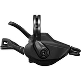 Shimano XTR SL-M9100 12-speed MTB shift lever with instant and multi-release technology, mounted on bicycle handlebars.