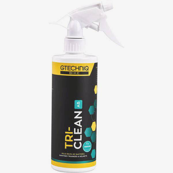 Gtechniq Bike Tri-Clean antibacterial cleaner for cycling gear and helmets, 500ml bottle, workshop setting.