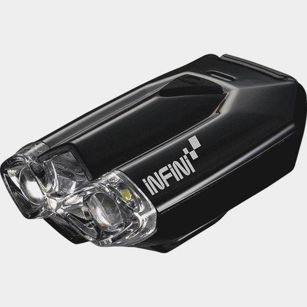 Infini Lava Super Bright Micro USB bike front light with quick release bracket in black, mounted on a bicycle for visibility.
