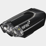 Infini Lava Super Bright Micro USB bike front light with quick release bracket in black, mounted on a bicycle for visibility.
