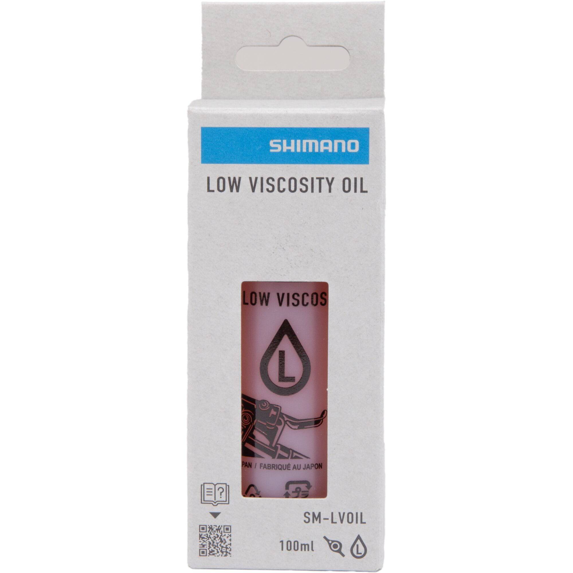 Shimano SM-LVOIL Low Viscosity Mineral Oil 100ml for XTR M9200 and XT M8200 disc brake systems, shown in the image.