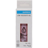 Shimano SM-LVOIL Low Viscosity Mineral Oil 100ml for XTR M9200 and XT M8200 disc brake systems, shown in the image.