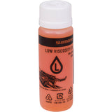 Shimano SM-LVOIL low viscosity mineral oil 100ml for XTR M9200 and XT M8200 brake components, shown in the image.