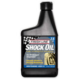 Finish Line Shock Oil 7.5 wt for bicycle suspension forks, 16 oz bottle, workshop use, clear liquid in a labeled container.