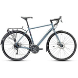 Ridgeback Tour touring bike with Shimano Claris shifters and mechanical disc brakes, ready for adventure on scenic roads.