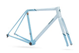 Colnago Steelnovo steel road bike frame set with integrated cables and 3D-printed lugs, shown in a studio setting.