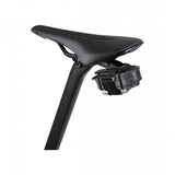 Topeak Free Pack Duo Fixer bike saddle bag with mounting straps and tyre levers in black, designed for cycling accessories.