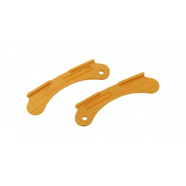Jagwire Yellow Brake Pad Tuner for precise rim brake alignment on road and mountain bikes, shown in a workshop setting.