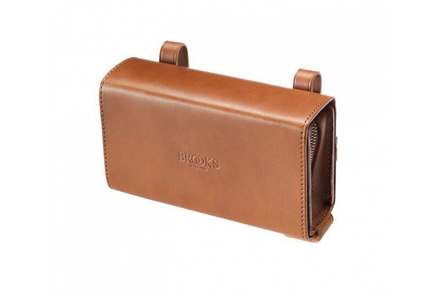 Brooks D-shaped pannier bag with removable inner purse, handmade in England, featuring durable material and secure fastening.