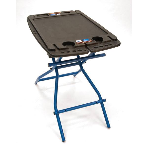 Park Tool PB-1 portable bike maintenance workbench with foldable design, ideal for workshop and bike repair tasks.
