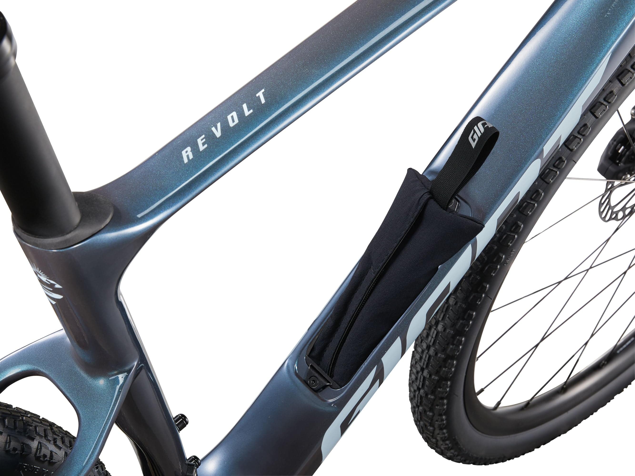 Giant Revolt Advanced 1 gravel bike with adjustable wheelbase and integrated storage compartment, black and silver frame, mounted on a stand
