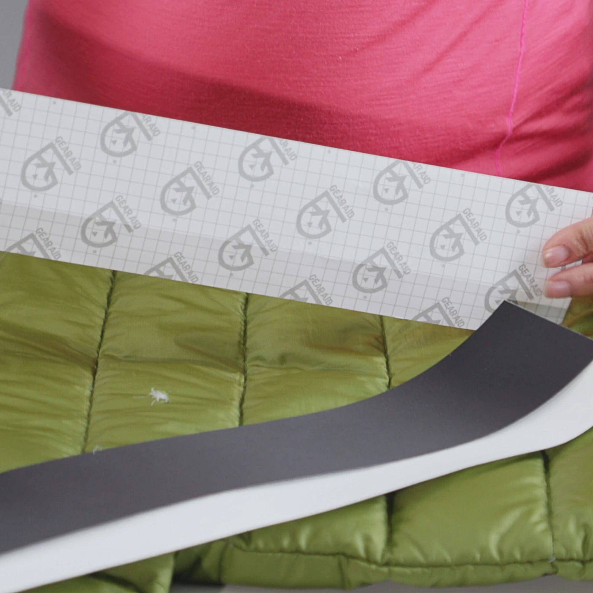 Gear Aid Tenacious Repair Tape in clear PVC for weatherproof outdoor gear patching and repairs.