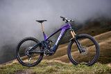 Giant Reign Advanced E+ 0 2026 electric mountain bike with SyncDrive Pro 3 motor and Maestro suspension, shown on trail.