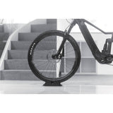 Black Topeak Wheel Chock stabilizer for bike front wheels up to 29" x 2.6" in size, designed for tire support and stability