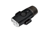 Topeak HeadLux 100 USB bike light with 100 lumens, rechargeable front light attached to a bicycle handlebar.
