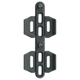 SKS cage shifter and bike bottle holder adapter with adjustable mount and Velcro straps, designed for bike accessories.
