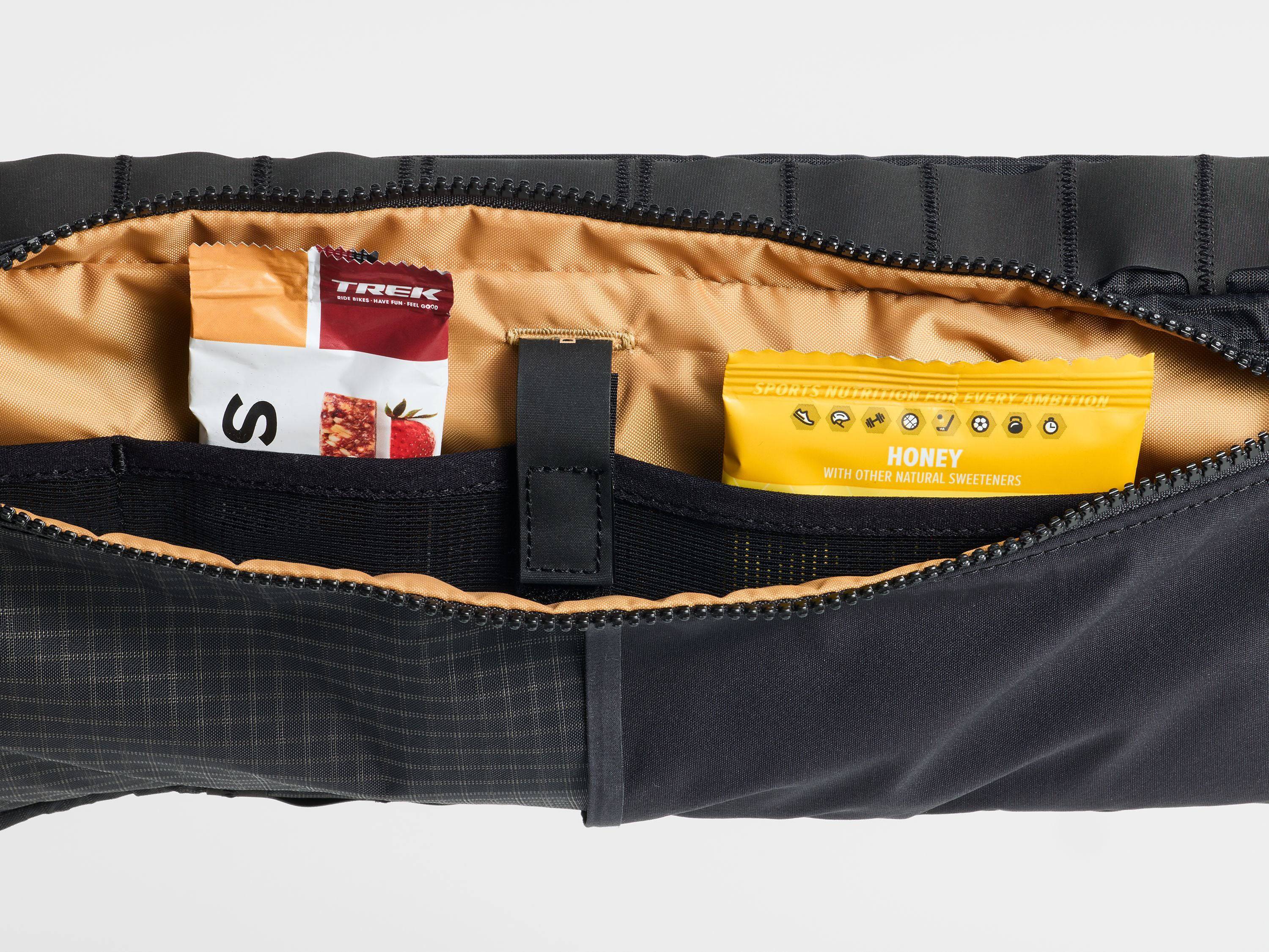 Trek bike packing adventure frame bag attached to a bicycle frame, durable cycling storage accessory for long-distance cycling trips.