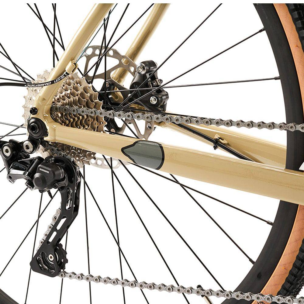 Cinelli Zydeco Apex XPLR gravel bike with SRAM 1x12 drivetrain and carbon fork, shown with disc brakes and rugged tires.