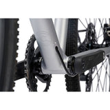 Cinelli Zydeco Silver Bootleg gravel bike with front rack, designed for urban commuting and mixed terrain riding.