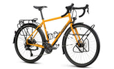 Genesis Tour de Fer 40 2026 touring bike with Shimano 2x10-speed drivetrain, featuring durable frame and drop handlebars.