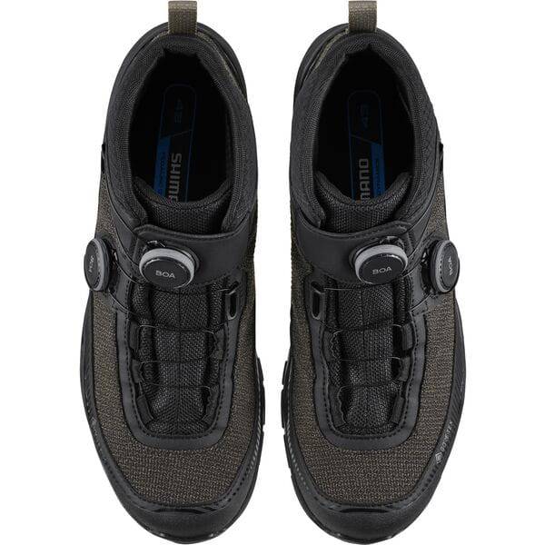 Shimano EX9 MTB shoes with BOA Fit System and waterproof Gore-Tex, shown in black with rugged sole and secure fastening system.