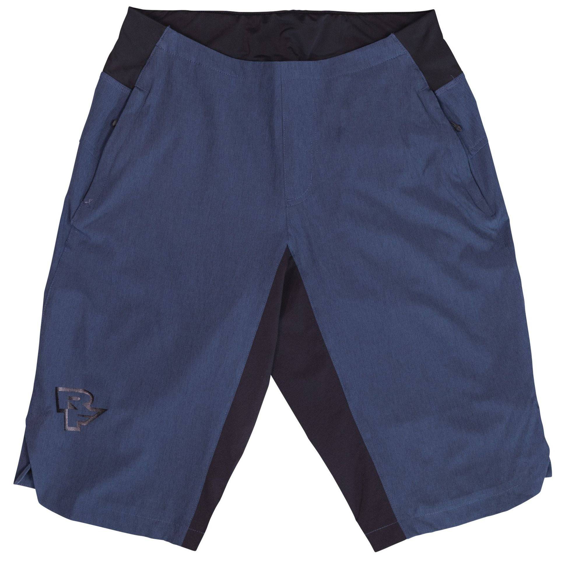 Race Face Traverse women's mountain biking shorts with zippered pockets and ventilation, designed for outdoor cycling comfort.