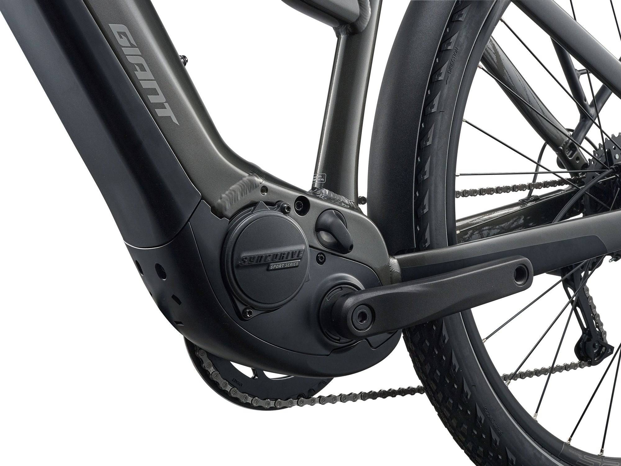 Giant Explore E+ 4 Stagger MY26 e-hybrid bike with Long-Range EnergyPak 800 battery and Aegis safety features, parked outdoors.